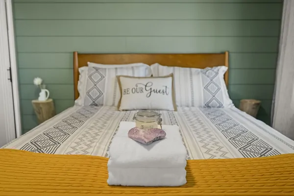 Primary bedroom with queen bed : Treehouse Tahoe Cabin with Private Hot Tub
