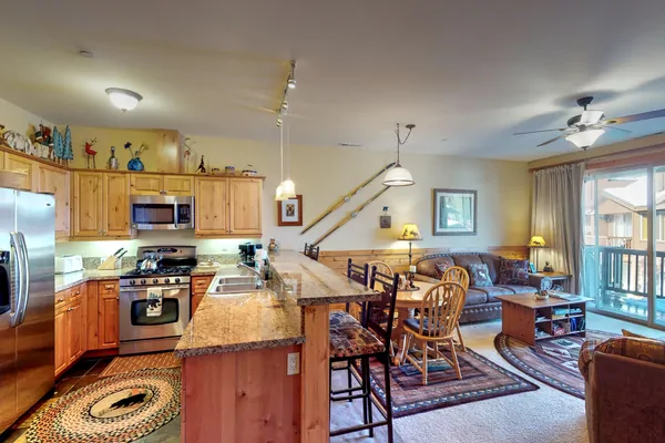 Living room with nearby kitchen: Truckee Cinnabar Vacation Retreat