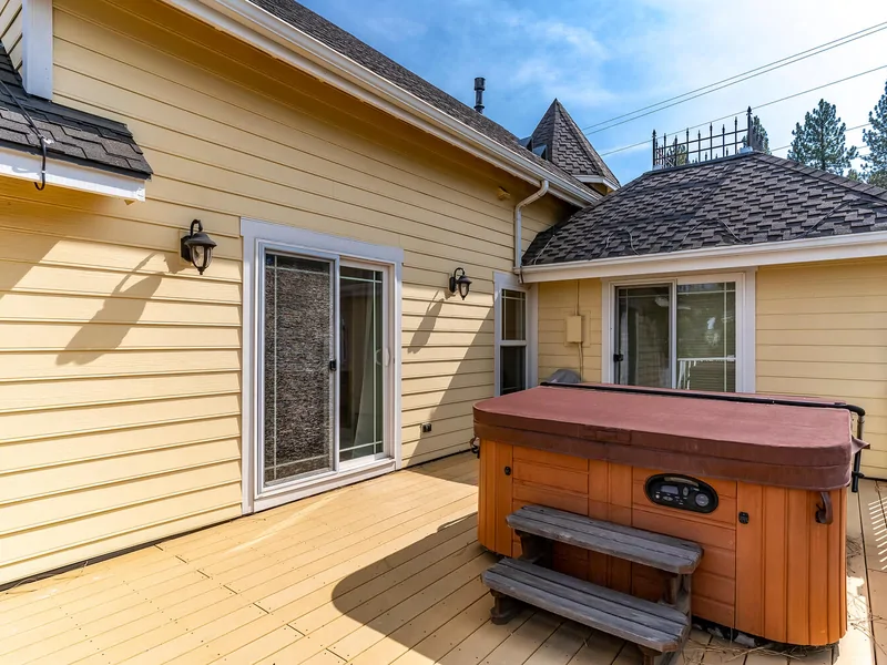 Primary Bedroom Patio w/ Hot tub and View of River: Holy Cow Downtown Riverfront