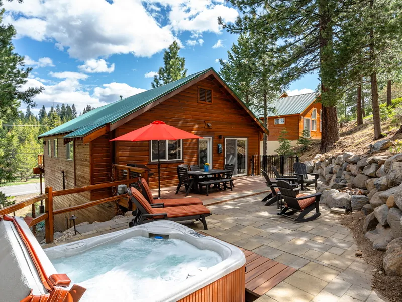 Back patio with hot tub: Mountain Relaxation Haven