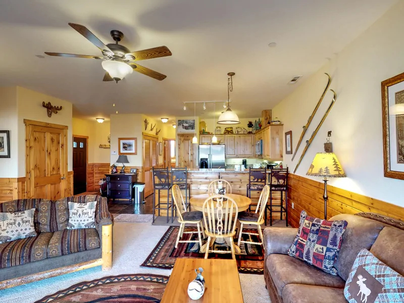 Living room with nearby kitchen and dinner table: Truckee Cinnabar Vacation Retreat