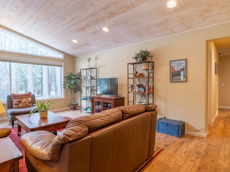 Living Room to Hallway: Three Pines Family Cabin